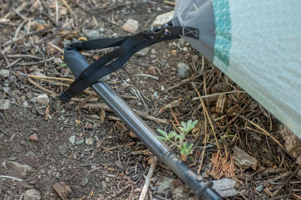 Trekking pole tip extender tube and pocket