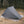 Gossamer Gear Polycro Ground Cloth under a fully pitched tent in a forest clearing