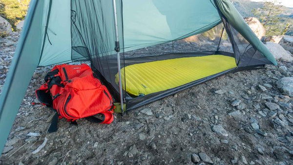 Tarptent ProTrek interior through the open door with gear and mountain views